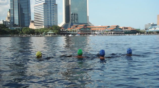 Open water swimmer glides forward