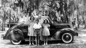 Bob around age nine in White Springs, with another family showing off their new Ford Coupe’