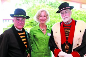 Vernon Myers, Mayor of the City of Palatka, Mary Coleman and Douglas Coleman, wearing official garb of the Order of the Knights of Wines of Brittany
