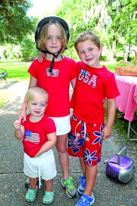 Poppy, Will and little Lucy Larkin all dressed up for the Cortez Park parade
