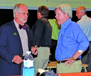 Stephen Tocknell, who was hired by the 5 Points Merchants Association to develop a concept plan to improve traffic flow and bicycle and pedestrian safety in the Five Points commercial district, talks to 5 Points property owner Mike Shad during a recent public forum.