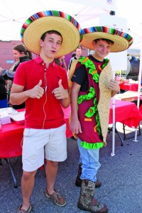 Sandwich boards updated: “Walking Taco” Connor Sidman of Avondale with friend Sean Frechette call attention to the food booths at St. Matthew’s Fall Bazaar on Oct. 27