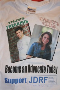 A T-shirt with photos of son Tyler and daughter Casey