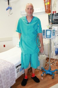 Patient Anthony Roesch models the new Vestex shirt and sports-style shorts