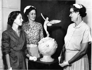 In May 1958, Mrs. Carl Durham and Mrs. W.T. Cheshire, Jr., daughters of sculptor Adrian Pillars, and his widow, Mrs. C.H. Stewart, look at what is believed to be the original plaster model of Life. Photo courtesy of Wayne Wood.