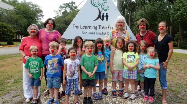 Preschoolers don red noses to help children in need