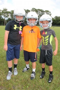 Helmets on, these boys are ready for the first day of practice for the Venetia Athletic Club football season.