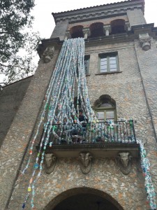 Bolles Hall draped with plastic bottles representing a week’s worth of recycling at the school.