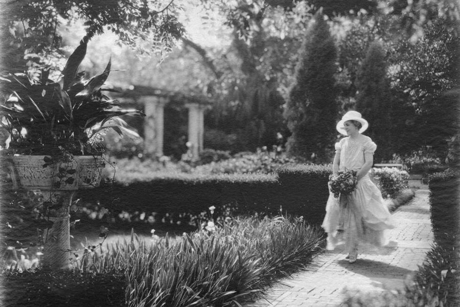 Ninah Cummer (Woodward Studio, Ninah M. H. Cummer (1875 – 1958) in her garden, c. 1929, gelatin print, The Cummer Museum of Art & Gardens Archives)