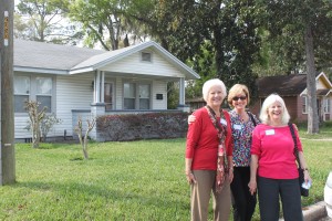 Sisters Anita Tiffany Dunford of San Jose, Marie Tiffany Howell of Ortega and Melanie Tiffany Bird of Avondale in front of their childhood home on Camden Avenue in St. Nicholas.