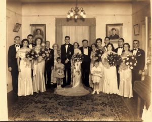 Wedding, August 19, 1934, Jacksonville, Florida. Portraits of Helen’s parents hang on the back wall of her Springfield home.