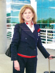Mary Dudley in uniform as a Delta Airlines flight attendant