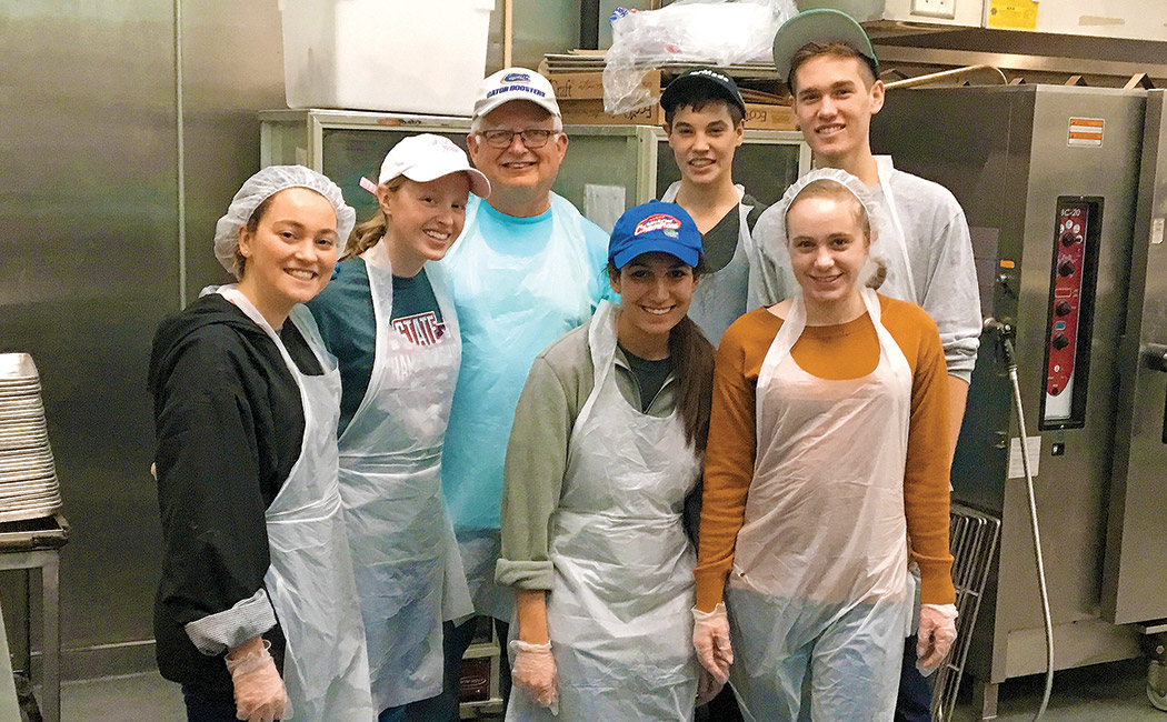 Helping out at the I.M. Sulzbacher Center from Help 4 Jax are Courtney Crawford, Casey Goodwin and her father, Sal Goodwin, Liam Nields, and Isaiah Nields. Front row: Taylor Batah and Jordan Polster