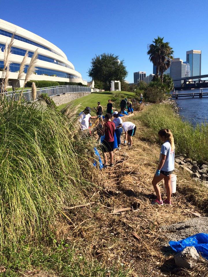A crew of nearly 20 cleaned up the Northbank Riverwalk after Hurricane Matthew came through. (Photo by Alicia Smith)