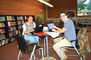 Seniors Maria Sattah of San Jose and Thomas Monisky of San Marco take advantage of some quiet study time in the newly renovated student learning center at Wolfson High School.