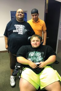 The ILRC assisted the Rodriguez family from Port Lavaca, Texas, who sheltered in Jacksonville during Hurricane Harvey, with a wheelchair battery charger, standard wheelchair and transfer shower seat.
