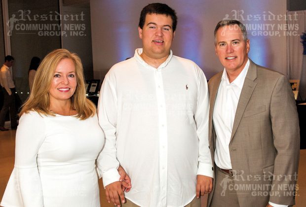 Jacksonville School for Autism Executive Director Michelle Dunham with son, Nick, and husband, Mark Dunham
