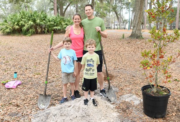 Brian and Aubree Hershoran planted a Holly Tree with their boys Jordan and Noah.