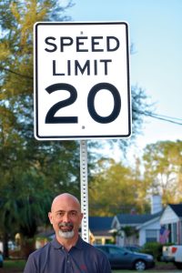 Miramar resident John Baxter drafted the ordinance which lowered the speed limit in his neighborhood to 20 mph.