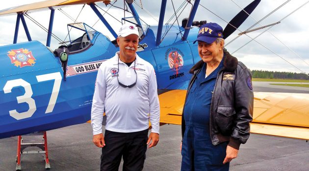 Seniors soar in restored biplane