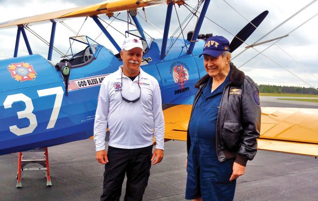 Seniors soar in restored biplane