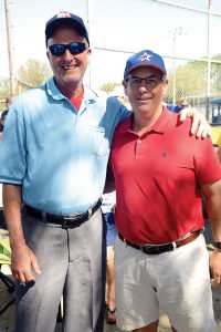 Umpire Bo Drew with longtime volunteer Tommy Brooke