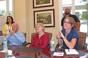 Lori Boyer, Jerry and Elizabeth Harty, Alicia MacLean and Jose Vasquez, at a June 14 meeting where MacLean told the group she had installed a sump pump that was supposed to come on just during heavy rains, “but now any time it rains at all the sump pump runs every 90 seconds.”