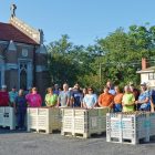 Some of the many volunteers who came to Trinity Lutheran Church June 2 to bag 12,500 pounds of potatoes.