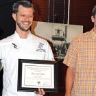 Executive Chef Scott Alters accepts the award for Gabrielle Saul of Rue St. Marc Restaurant.
