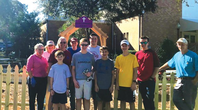 Eagle Scout installs fencing for HAB Community Garden