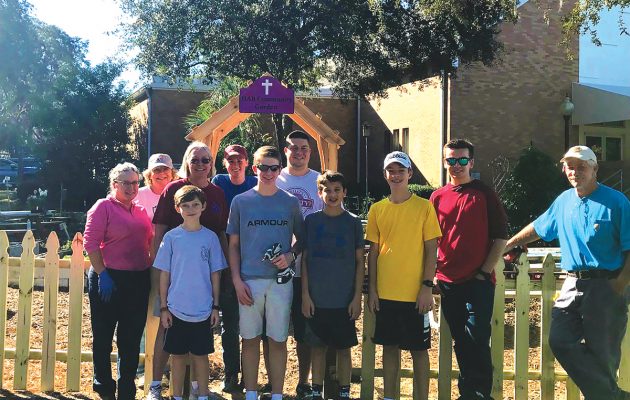 Eagle Scout installs fencing for HAB Community Garden