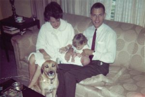 Sheila and John with their daughter, Martha, and Nipper the dog in 1962