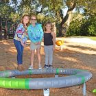 Enjoying the new playground equipment at Landon Park were Katherine Cumbow, Abigayle Moore and Amelia Taras.