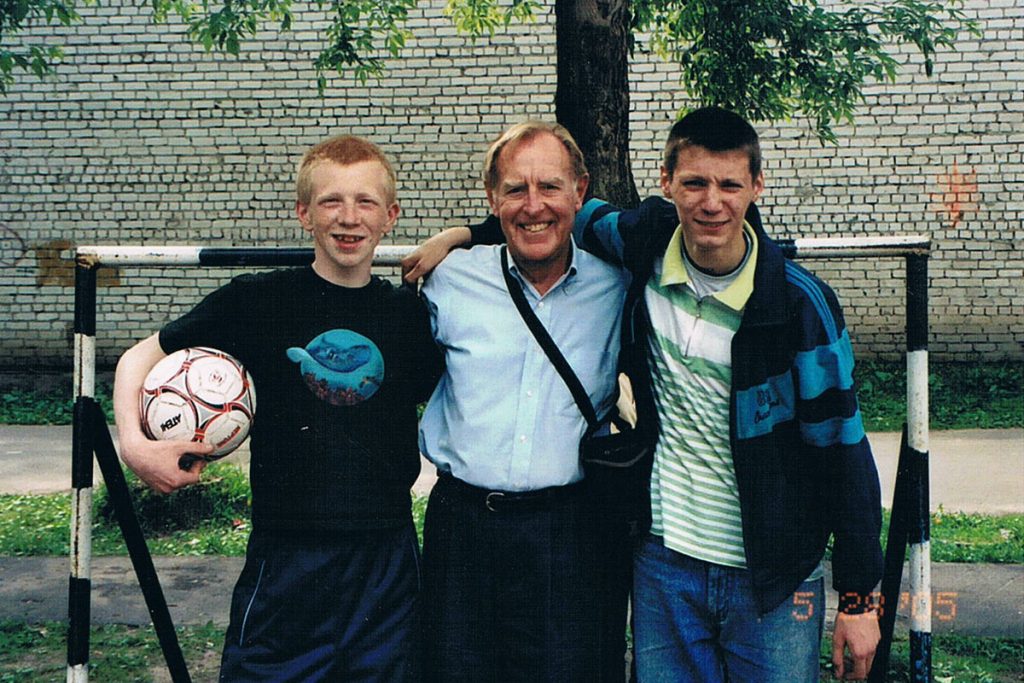 Bill Rust with soccer players in Russia, 2005