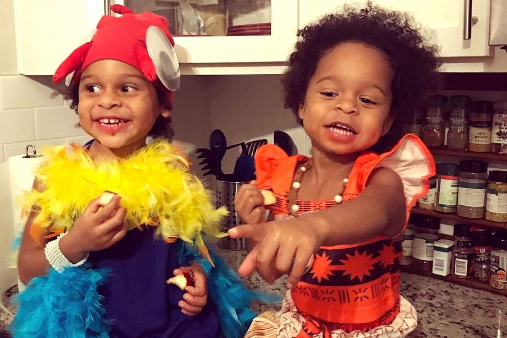 At Halloween 2018, the twins dressed as Disney characters Hei Hei the Rooster (Caroline) and Moana (Delilah)