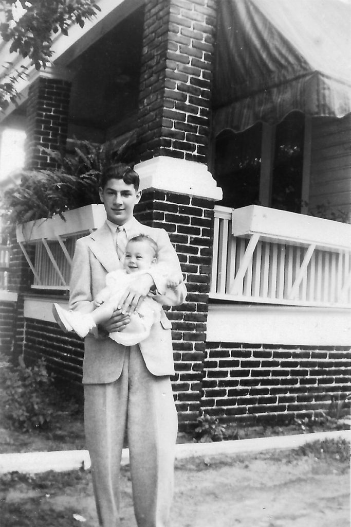 Uncle William holding niece Barbara in 1939 at the family home on 6th Street