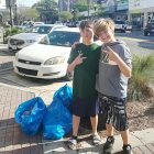Eli Orth and Max Payne helped pick up cigarette butts and other trash in 5 Points during the annual St. Johns River Cleanup.