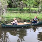 St. Johns Riverkeeper Lisa Rinaman and her son, Mark, paddle in San Marco’s Craig Creek looking for trash.