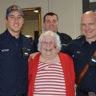 Riverside Presbyterian Home resident Beckie Preston with Joshua Boone, Brandon Ray and Dan Stift of the Jacksonville Fire & Rescue Engine Company and EMTS, Station 5