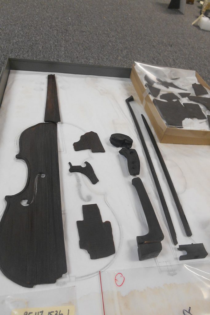 Pieces of a 150-year-old-plus musical instrument found in the Maple Leaf