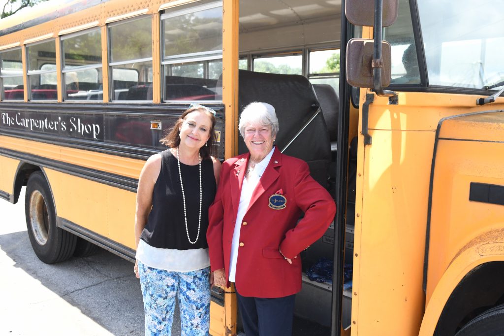Dr. Cheryl Wilder with Anne Nimnicht and the 34-year-old school bus “Old Yeller.”