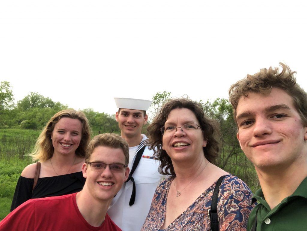 McAdams and his family celebrated in Great Lakes, Illinois. From left, Victoria Clark, Steven McAdam’s fiancée, Nathan McAdams, Steven McAdams, June McAdams and Aaron McAdams.