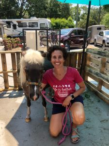 Dr. Sharon Leonard shows off Gypsy, an American Miniature Horse, during a neighborhood pet show at her home in Colonial Manor May 18.