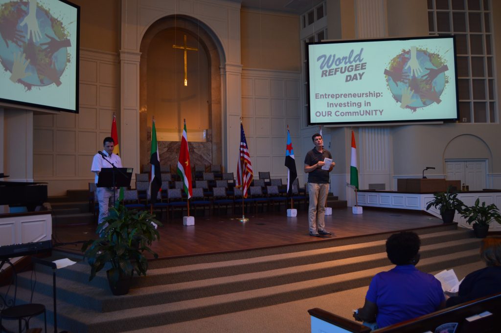 Southside Baptist Senior Pastor Dr. Gary Webber welcomes the crowd during the opening of the World Refugee Day celebration at his San Marco church June 13. Travis Trice of World Relief acted as Master of Ceremonies.