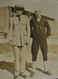 Edward Baker, right, after he was drafted into the U.S. Navy in 1943.