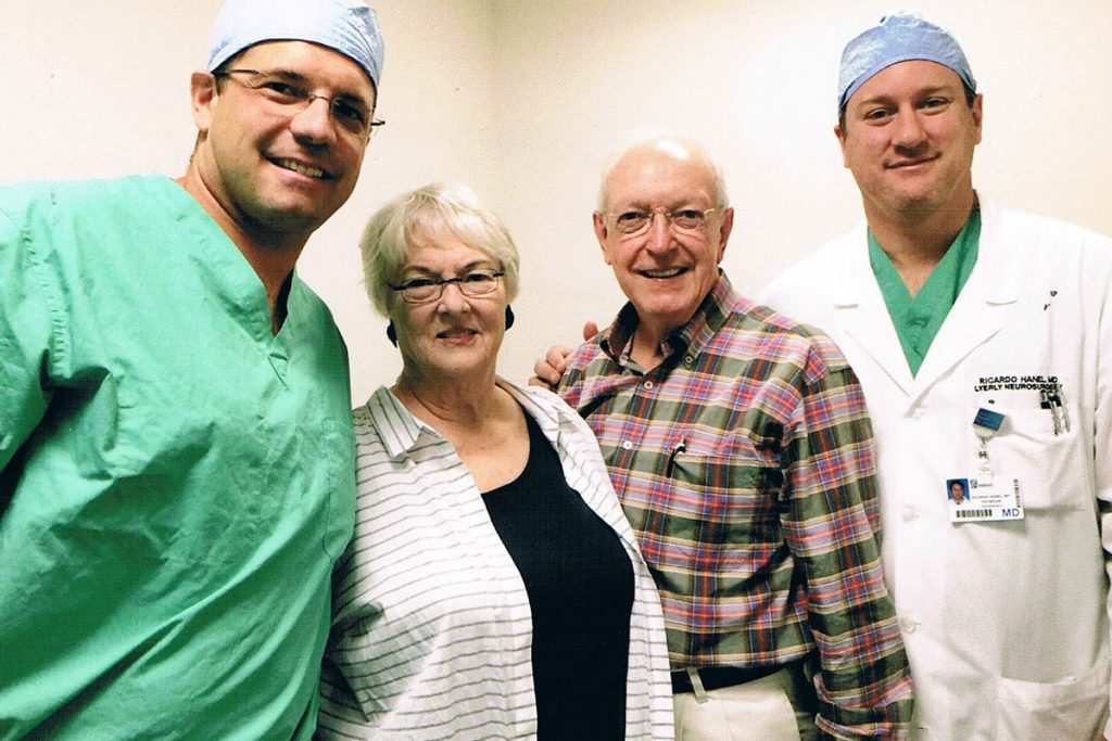Julie and Bill Mason, center, with Baptist Neurosurgeons Eric Sauvageau and Ricardo Hanel