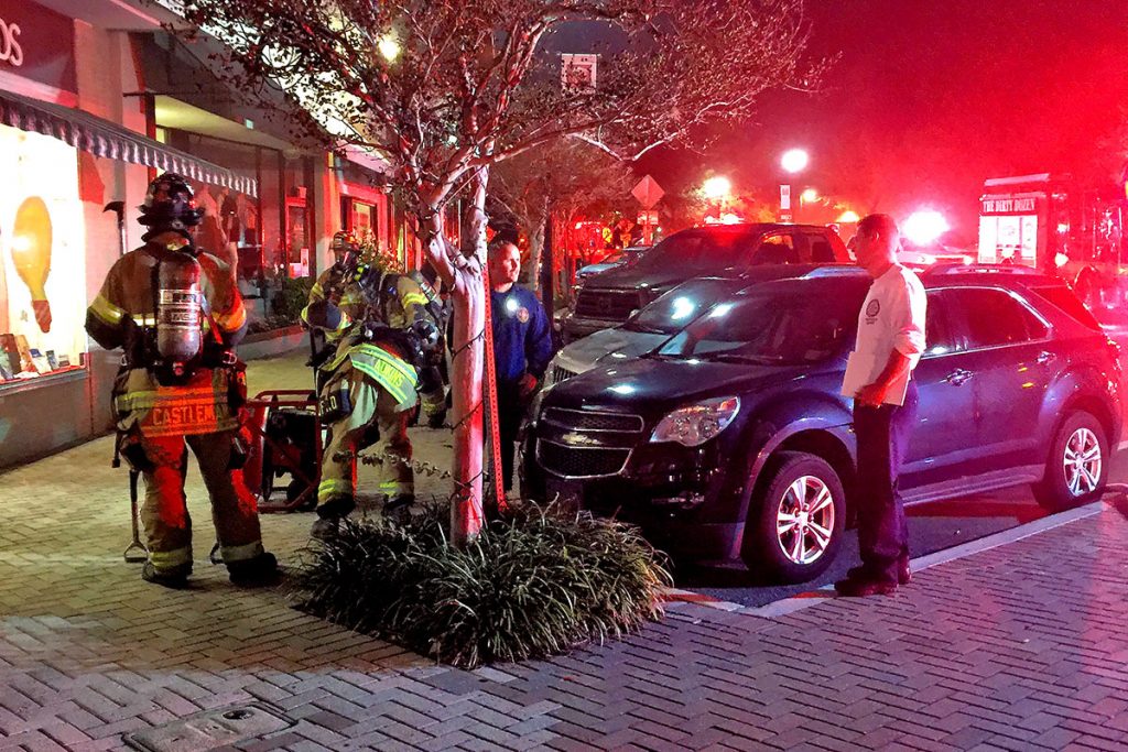 Firemen seek to put out a fire that started in the Beach Diner and poured toxic smoke throughout neighboring businesses in San Marco Square Nov. 2.