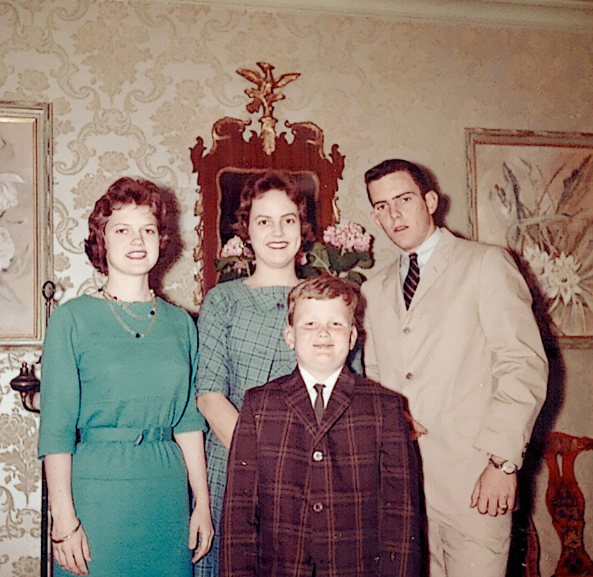 Sonja, Una, John and Charlie dressed for Easter, 1961