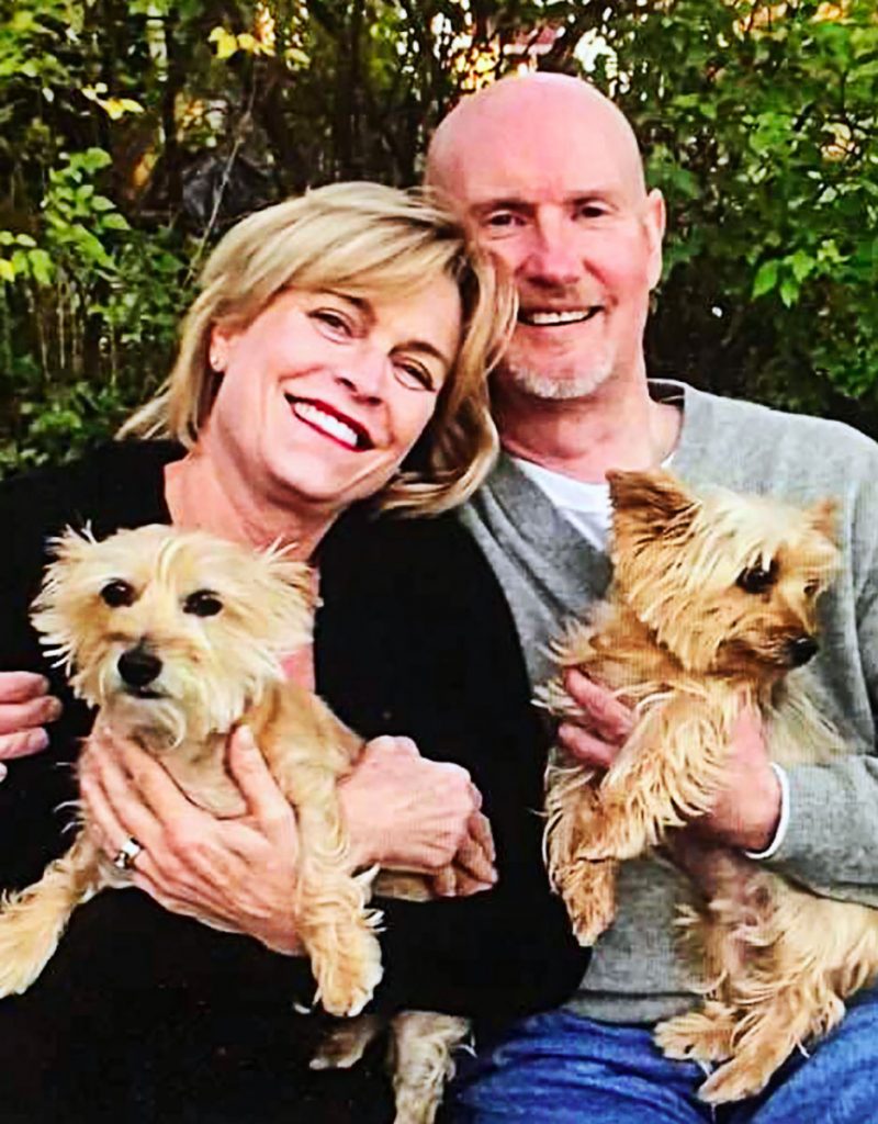 Pamela Newby Love and her husband Russell with their two rescue dogs, Ivan, a Hurricane Ivan survivor, and Jenny, who was rescued from a Fort Myers puppy mill.