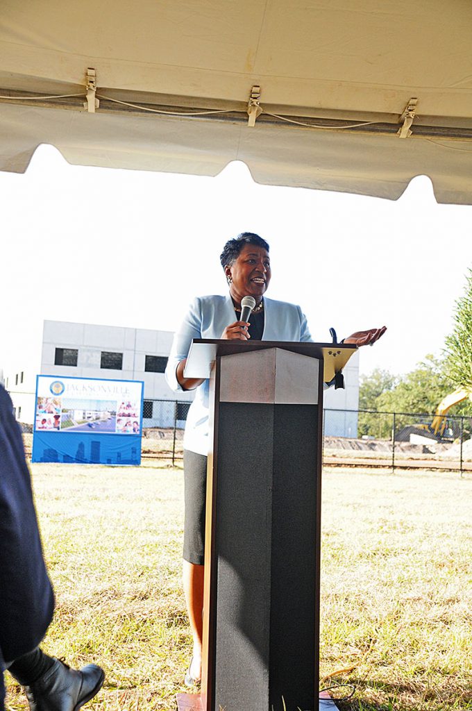 Superintendent of Schools Diana Green addresses a gathering celebrating the progress of construction on Jacksonville Classical Academy.